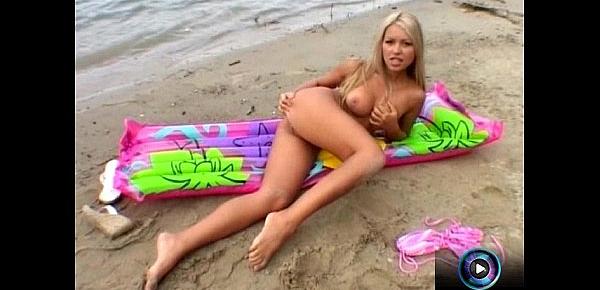  Bridgett strips at the beach naked and dance seductively